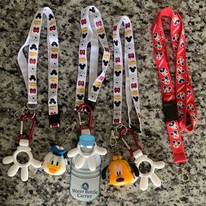 Disney water bottle carrier (3) and one lanyard.